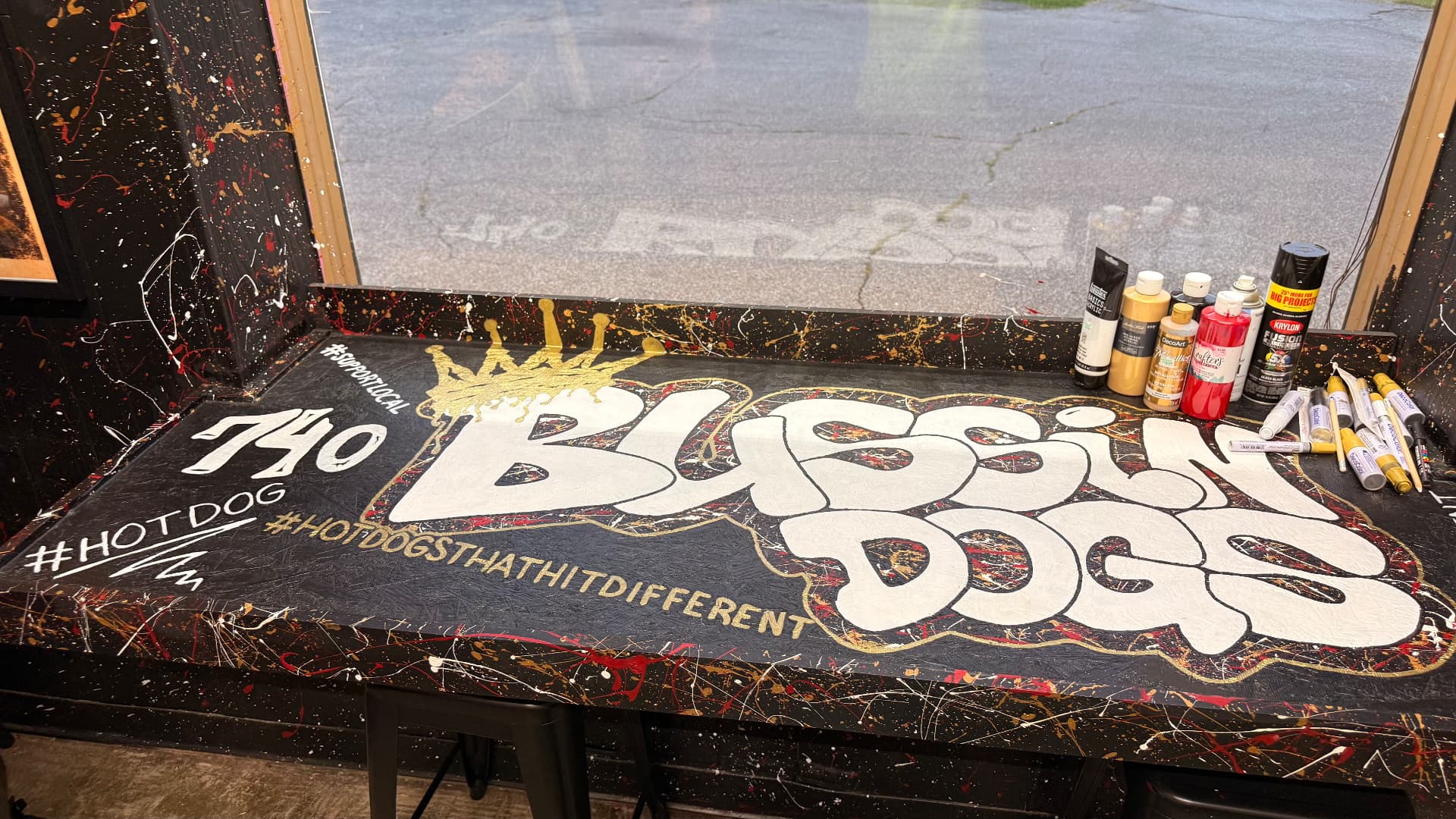 Hand-painted Bussin Dogs graffiti bubble-letter table top with gold crown